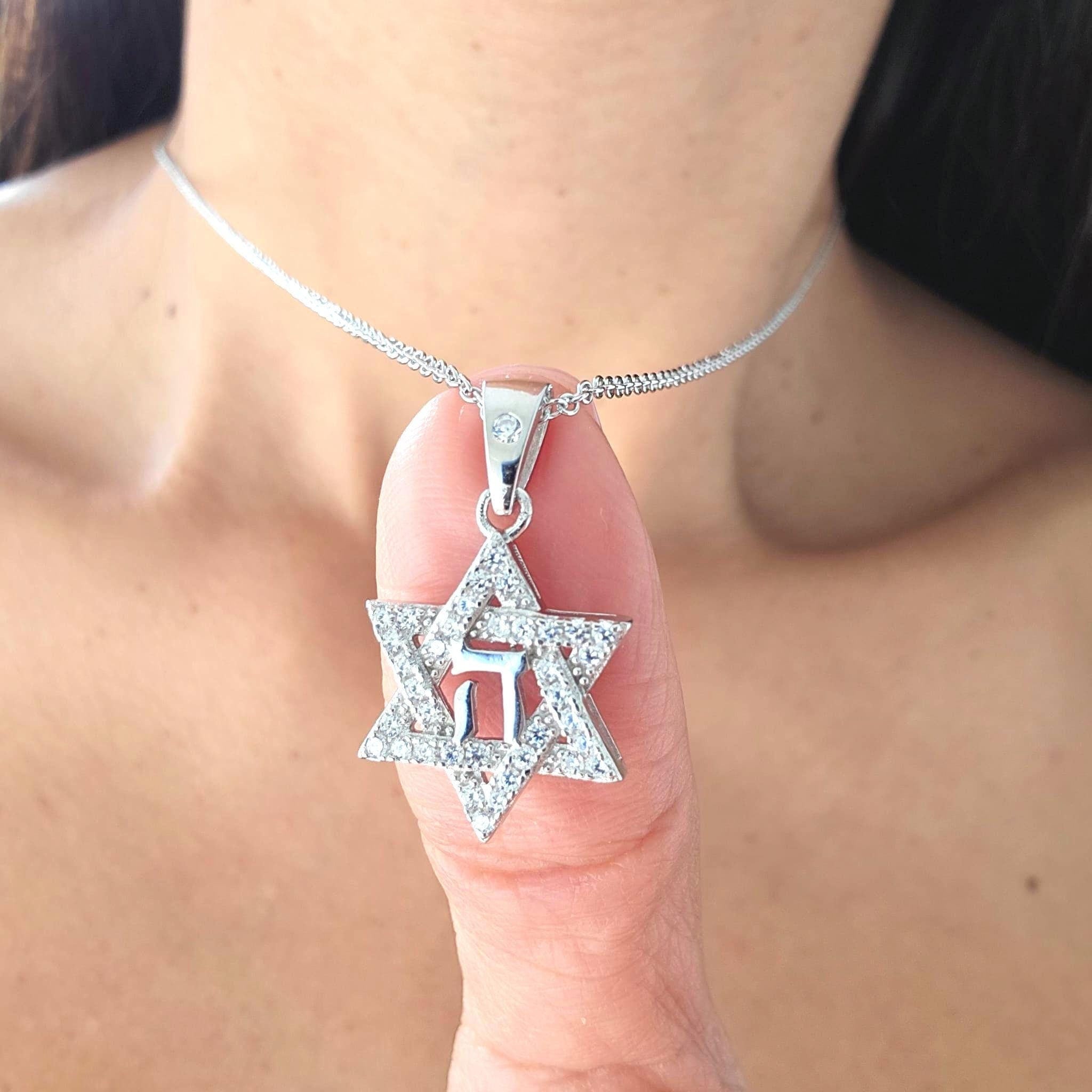 This YHWH Necklace is a powerful expression of faith, featuring the Hebrew Tetragrammaton ืืืื (Yahweh) in a sterling silver pendant. A significant piece of Judaica jewelry.